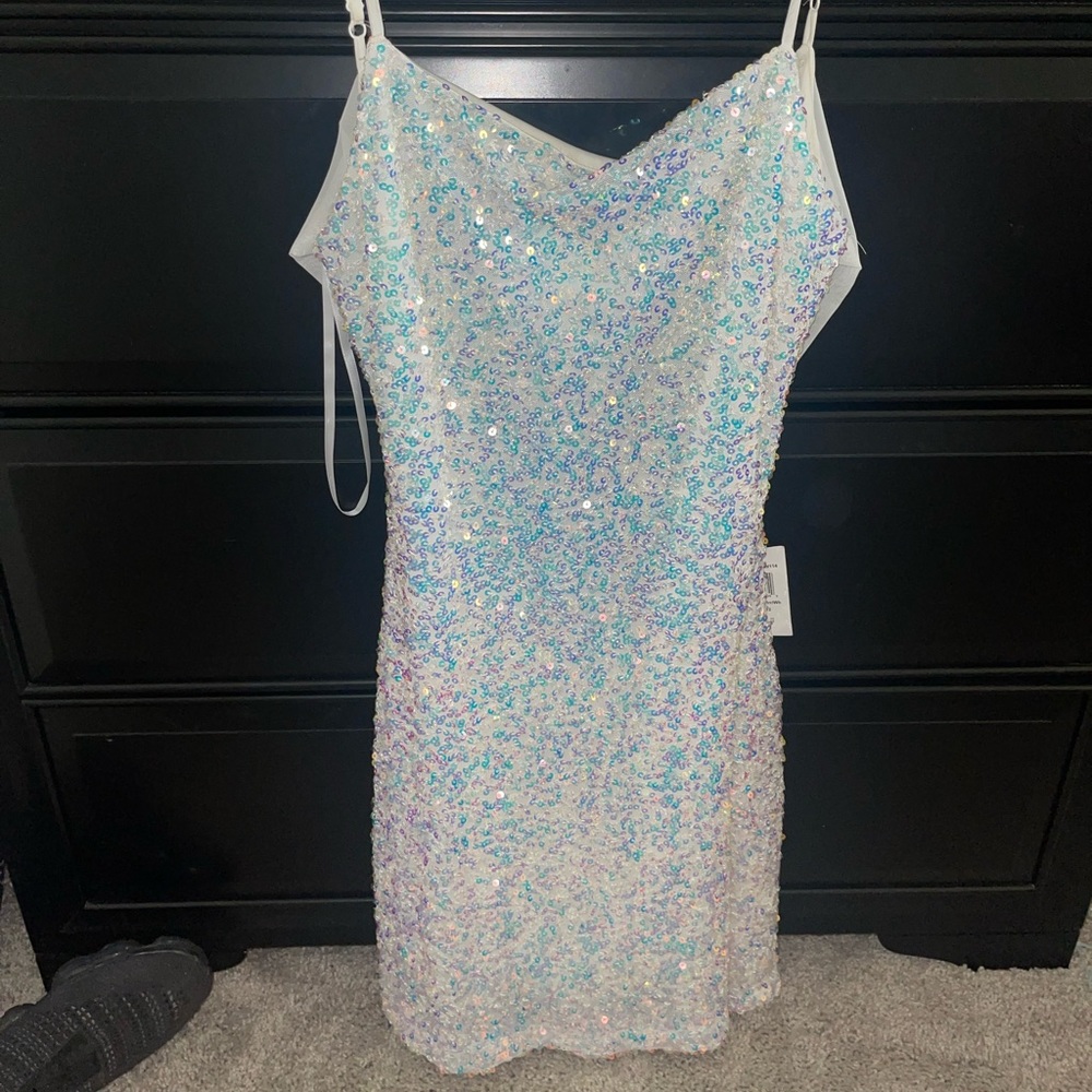 White shimmery short dress.